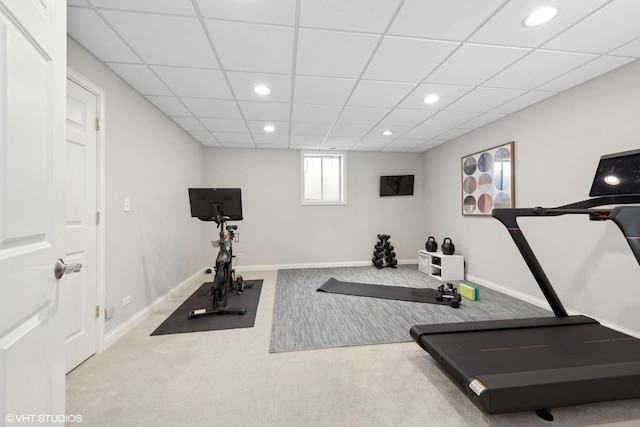 workout room with light colored carpet