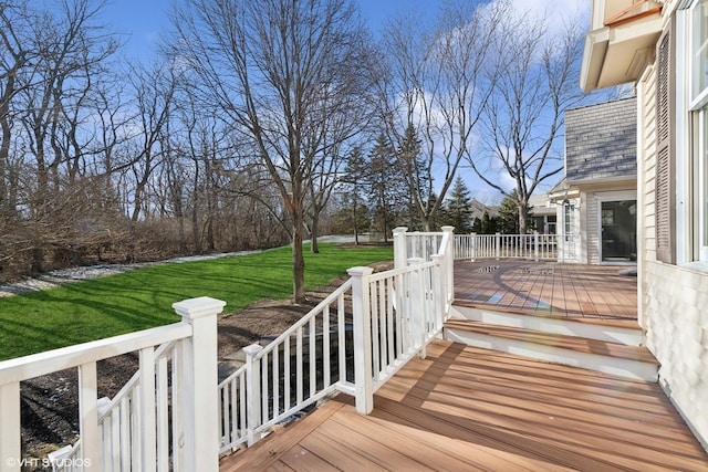 deck featuring a lawn