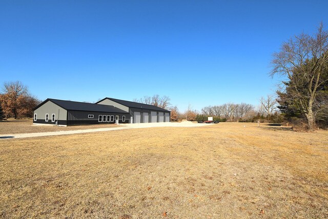 34740 S State Route 129, Braceville, IL 60407 - view of yard featuring driveway and a garage