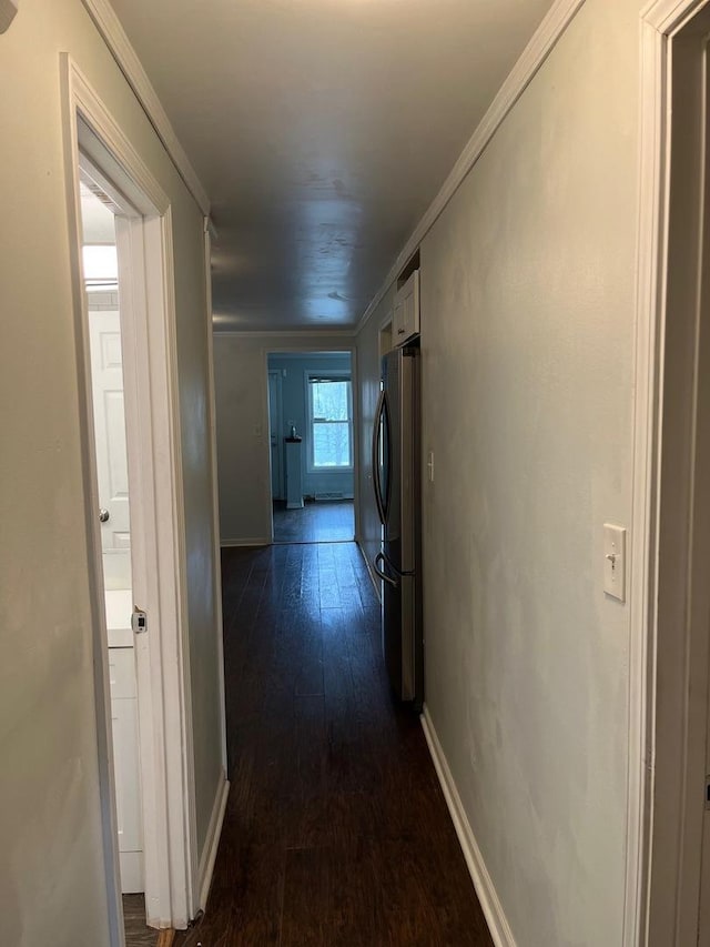 425 E 91st St, Chicago, IL 60619 - corridor with dark wood-style flooring, crown molding, and baseboards