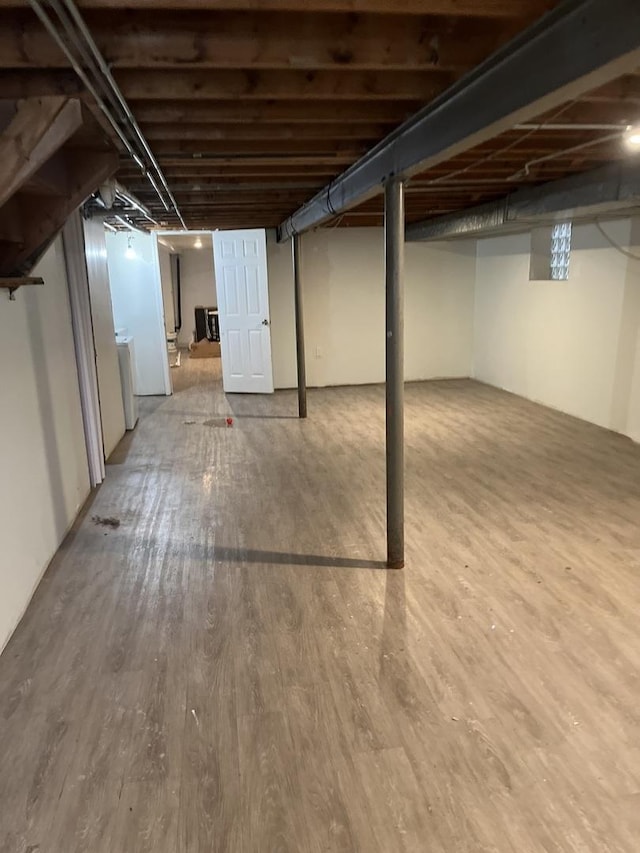 425 E 91st St, Chicago, IL 60619 - finished below grade area featuring wood finished floors