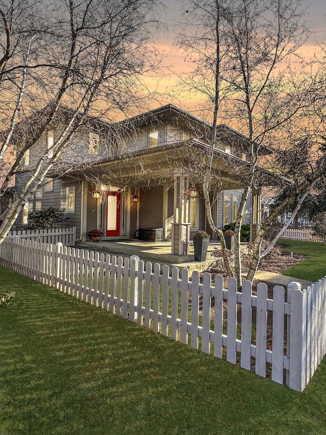 view of property exterior at dusk