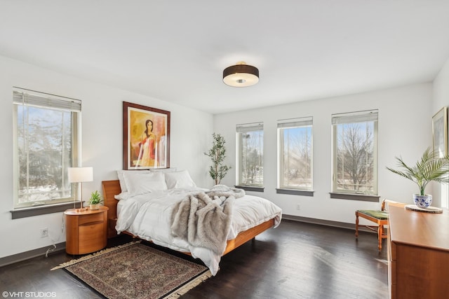 bedroom featuring dark wood-type flooring