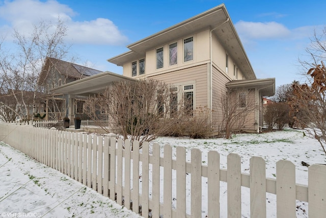 view of snow covered property