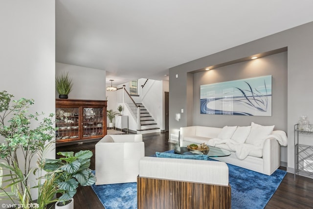 living room with dark hardwood / wood-style floors