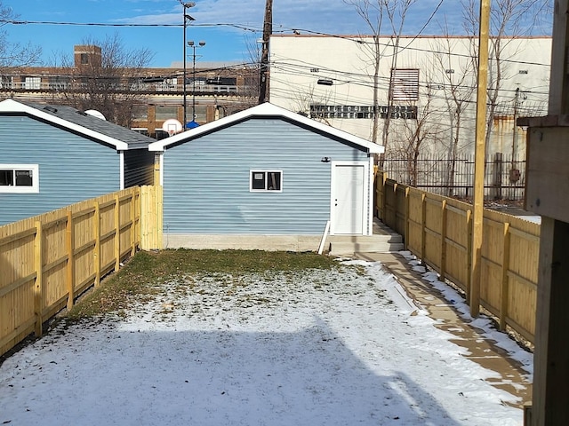 exterior space featuring entry steps and a fenced backyard