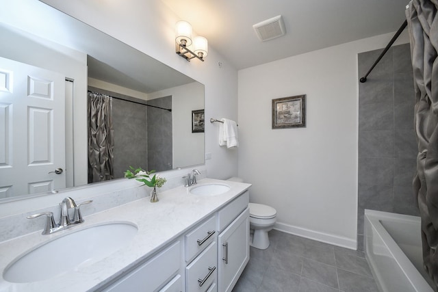 full bathroom with vanity, toilet, tile patterned flooring, and shower / bath combo with shower curtain