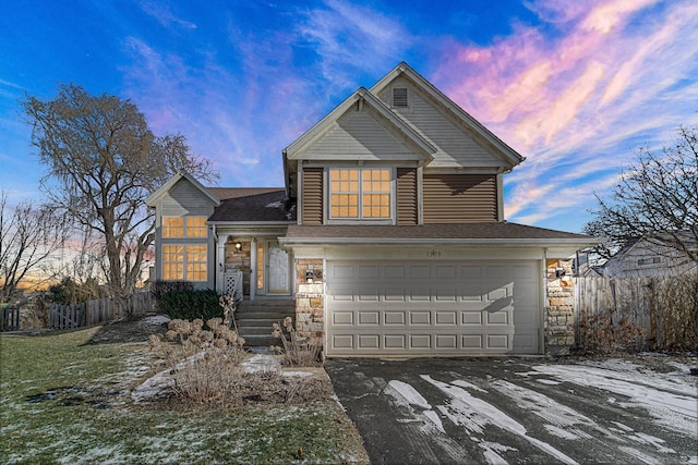 view of front of property featuring a garage