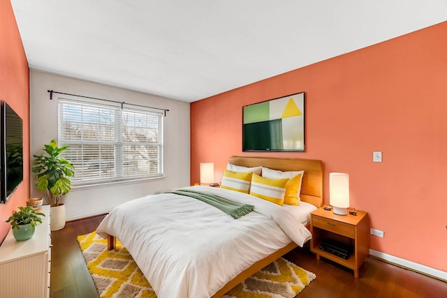 bedroom featuring dark wood-type flooring