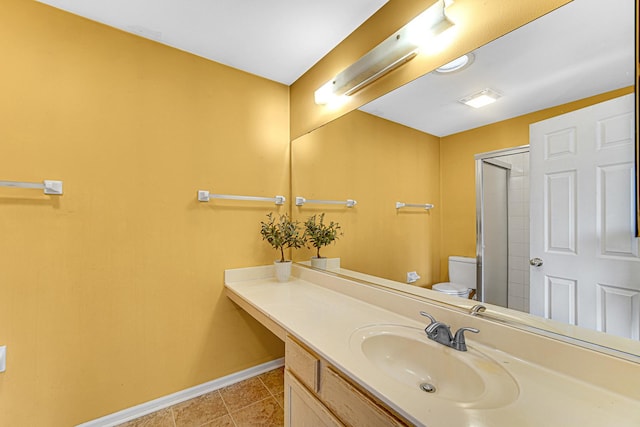 bathroom with toilet, a shower with door, and vanity