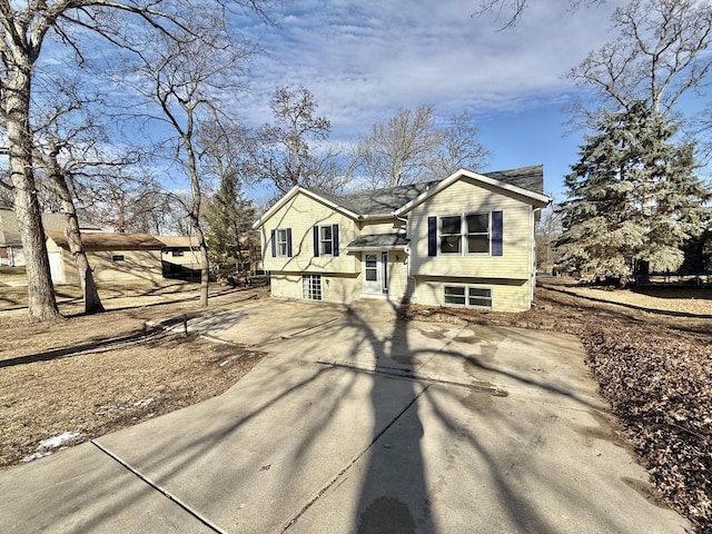 raised ranch featuring a garage