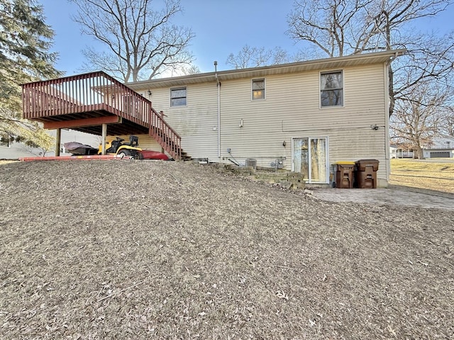 rear view of house with a deck