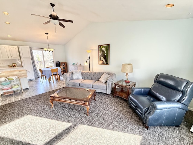 tiled living room featuring ceiling fan and lofted ceiling