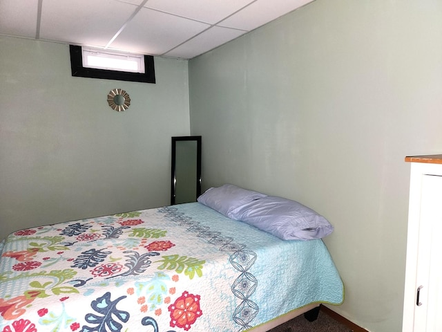 bedroom featuring a drop ceiling