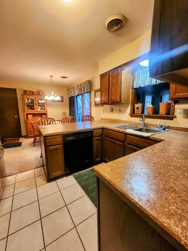 kitchen with dishwasher, pendant lighting, kitchen peninsula, sink, and light tile patterned floors