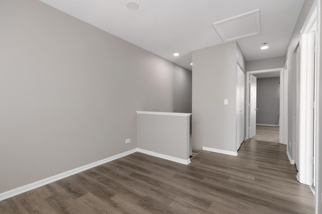 hallway featuring dark wood-type flooring