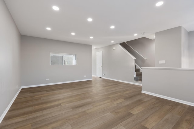 unfurnished living room with hardwood / wood-style floors