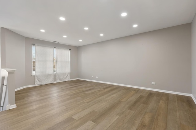 unfurnished living room featuring light wood-type flooring