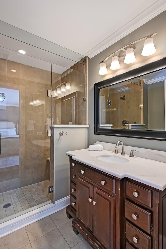 full bathroom with ornamental molding, a stall shower, tile patterned flooring, and vanity