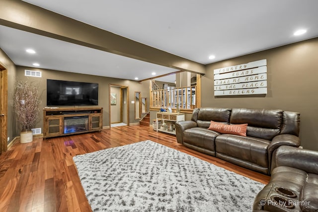 living room with hardwood / wood-style flooring