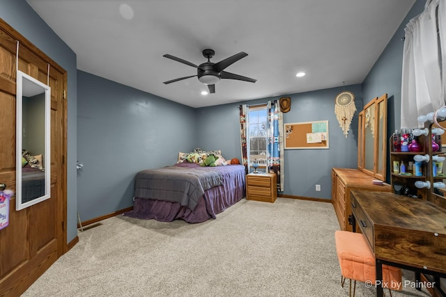 carpeted bedroom featuring ceiling fan