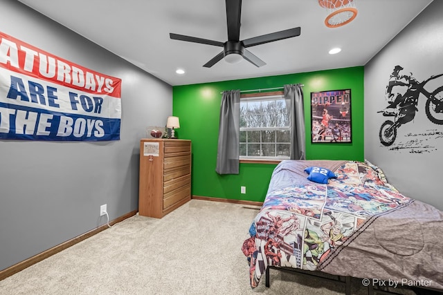 bedroom with ceiling fan and carpet floors