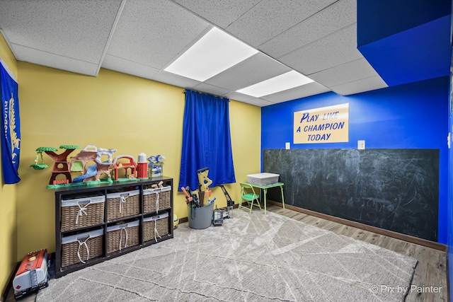 playroom featuring a drop ceiling