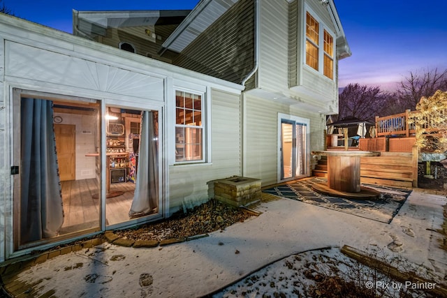 view of property exterior at dusk