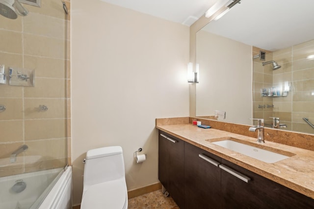 full bathroom featuring vanity, shower / bath combination with glass door, and toilet