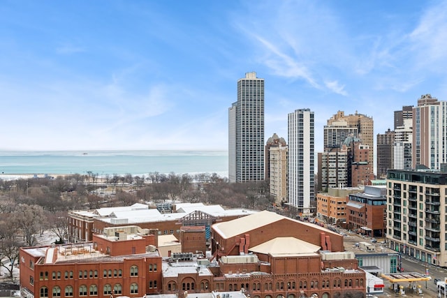 property's view of city with a water view