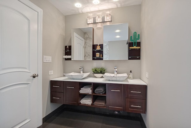 bathroom with vanity and tile patterned flooring