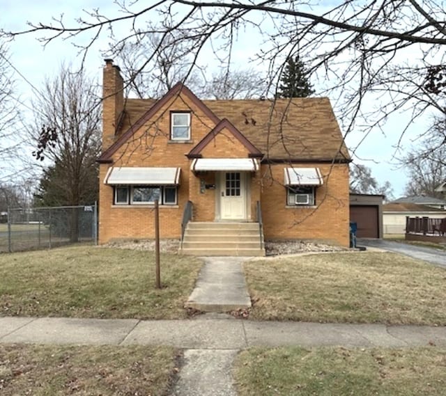 view of front of home with a front lawn