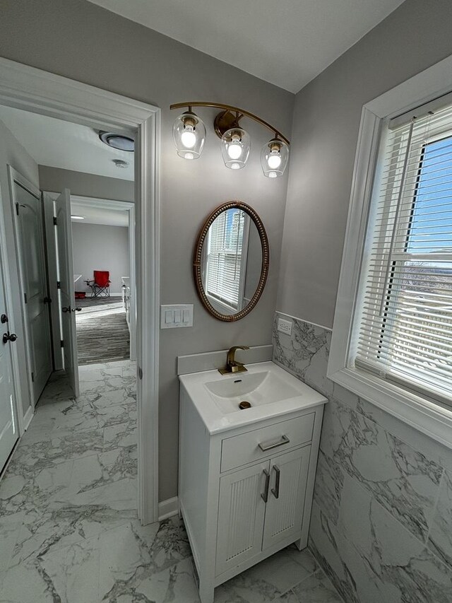 38W715 Huntley Rd, West Dundee, IL 60118 - bathroom featuring marble look tiles and vanity