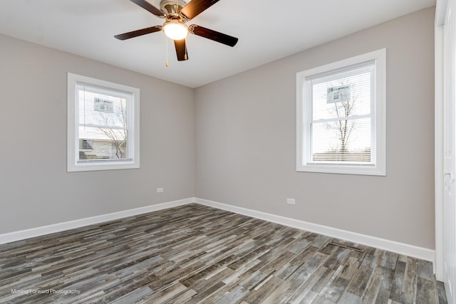 38W715 Huntley Rd, West Dundee, IL 60118 - empty room with dark wood-style flooring and ceiling fan
