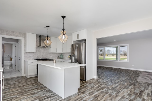 38W715 Huntley Rd, West Dundee, IL 60118 - kitchen with wall chimney range hood, stainless steel refrigerator with ice dispenser, dark wood-style floors, and light countertops