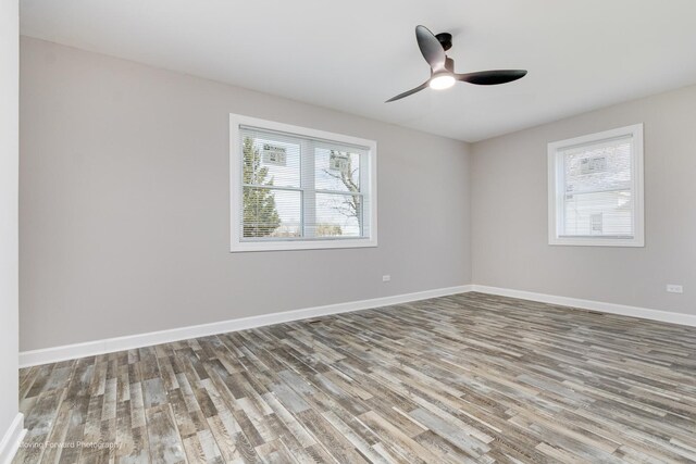 38W715 Huntley Rd, West Dundee, IL 60118 - spare room featuring wood finished floors and ceiling fan