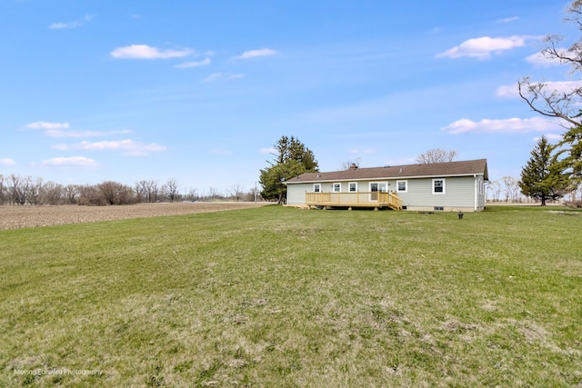 38W715 Huntley Rd, West Dundee, IL 60118 - view of grassy yard with a deck