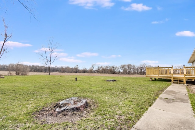 38W715 Huntley Rd, West Dundee, IL 60118 - view of green lawn with a deck and an outdoor fire pit