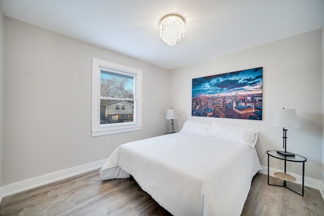 bedroom featuring hardwood / wood-style flooring