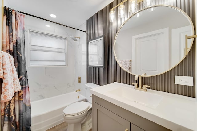 full bathroom with toilet, vanity, and shower / bathtub combination with curtain