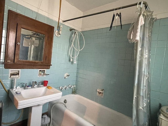 bathroom with backsplash and shower / bath combination with curtain