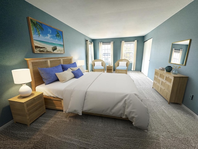 bedroom featuring baseboards and carpet flooring