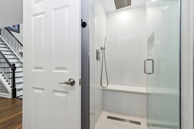 bathroom featuring an enclosed shower