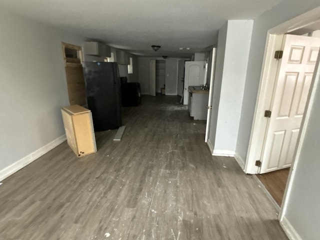 corridor featuring dark hardwood / wood-style floors