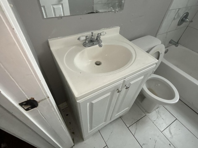 full bathroom with toilet, vanity, and tiled shower / bath combo