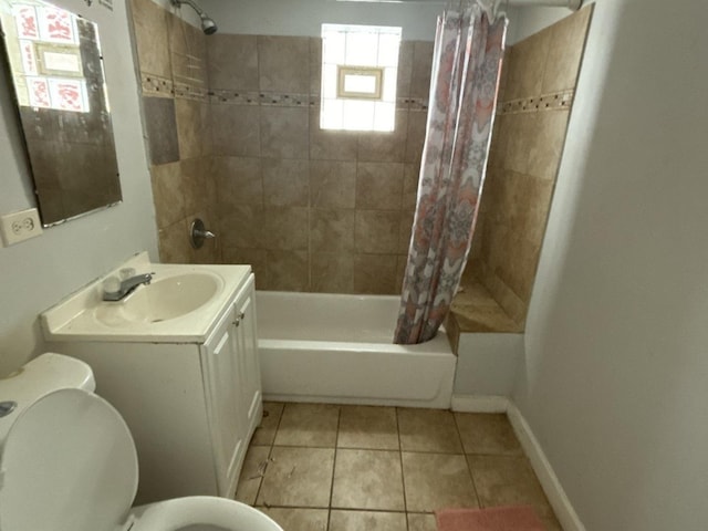 full bathroom featuring vanity, toilet, tile patterned floors, and shower / bath combo