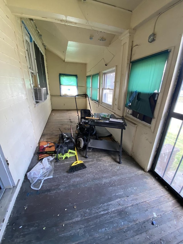 miscellaneous room with wood-type flooring and cooling unit