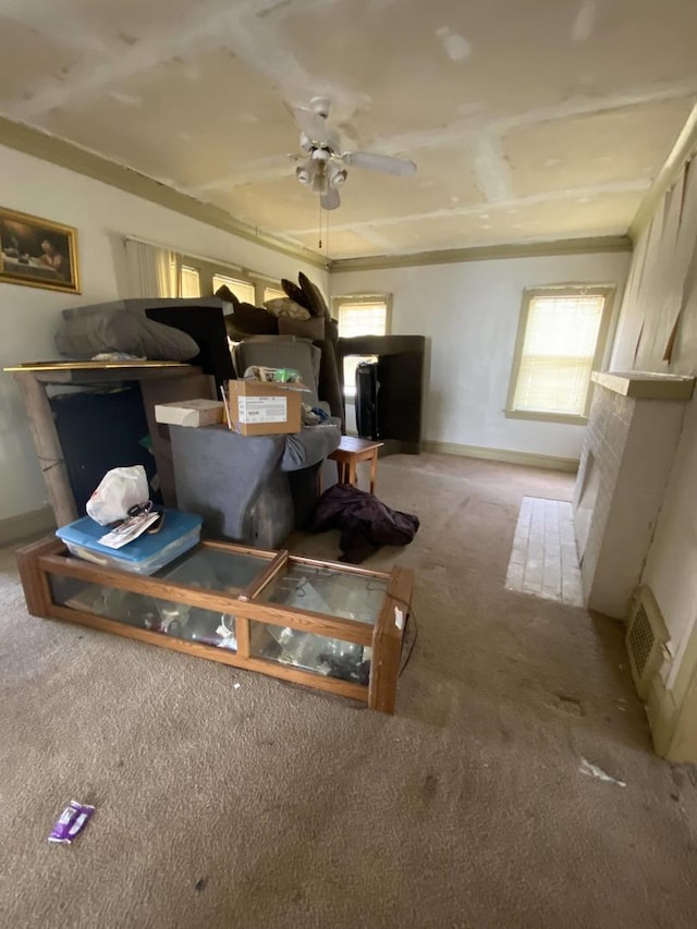 interior space featuring ceiling fan and carpet