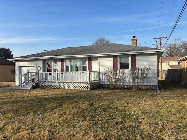 single story home with a garage and a front yard