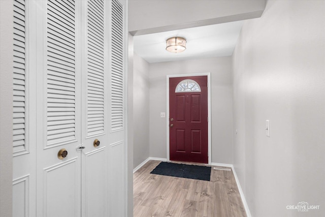 foyer entrance featuring light hardwood / wood-style flooring